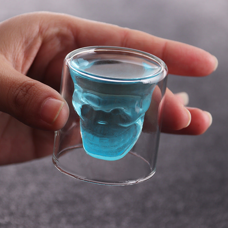 Cavira double wall skull-shaped borosilicate glass for whiskey, beer, and cocktails, featuring a detailed skull design.