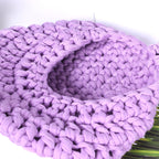 Handwoven boho cotton rope wall hanging net basket with woven flower design, ideal for home, bedroom, or living room storage.