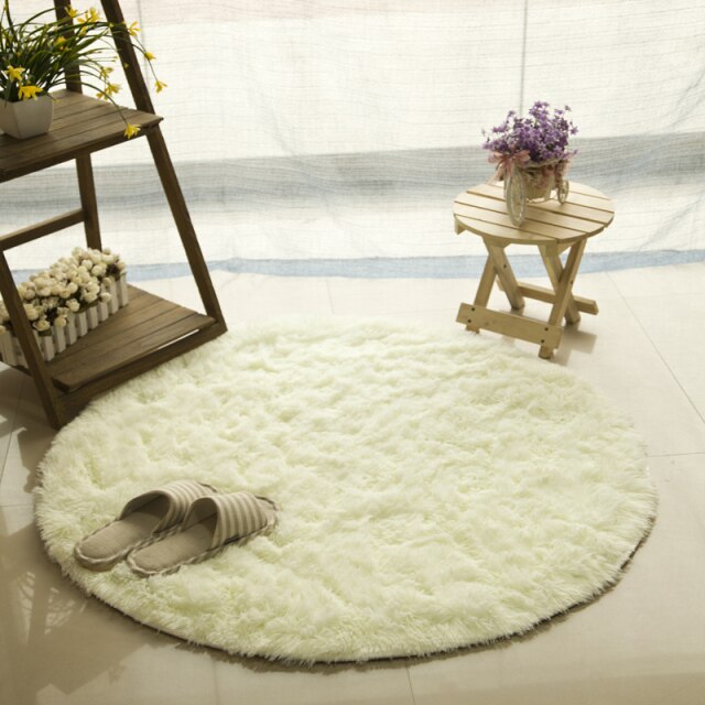 Round Cavira shaggy faux fur rug with 4.5cm deep pile, available in 6 sizes and 8 colors, non-slip latex base for bedroom or living room.
