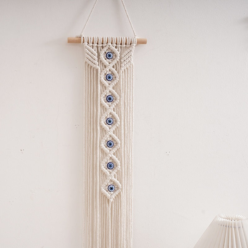 Handwoven cotton rope evil eye wall hanging tapestry with tassels, boho macramé décor on beech wood rod, 20x65cm.