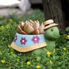Eprolo turtle-shaped flower pot decoration outdoor courtyard with lush plants and vibrant flowers.