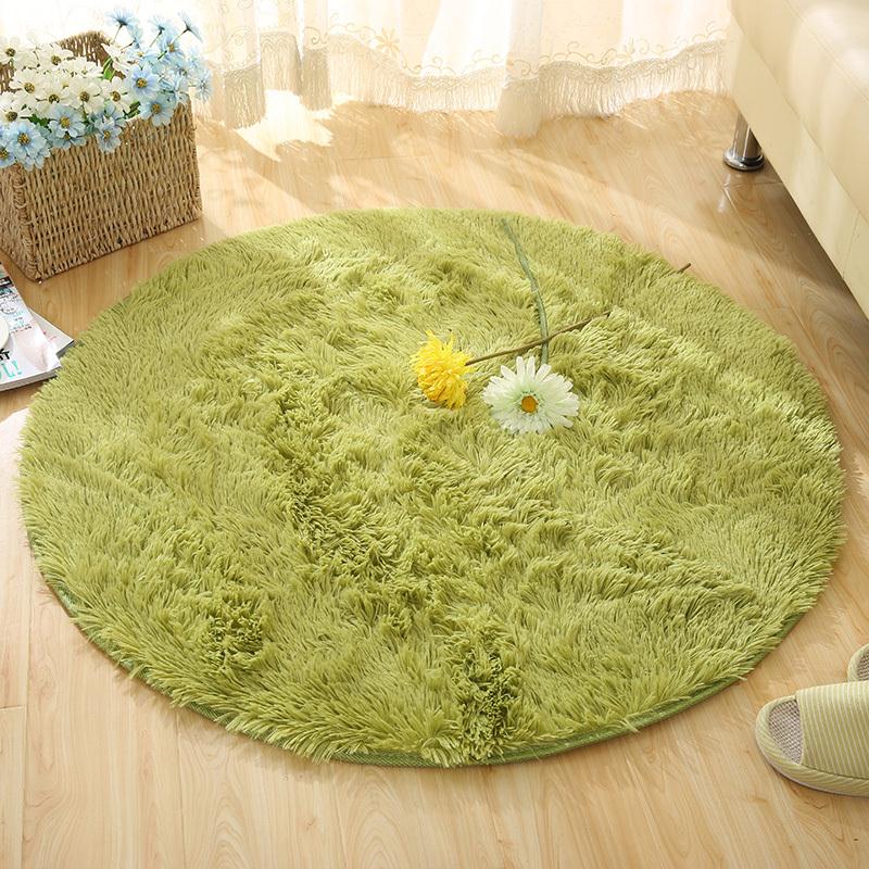 Round shaggy faux fur rug by Cavira with 4.5cm deep pile in various sizes and colors, non-slip latex base, ideal for bedrooms and living rooms.