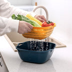 Cavira 6-piece plastic kitchen drain basket set with double-layer vegetable washing and drainage baskets in large, medium, and small sizes.