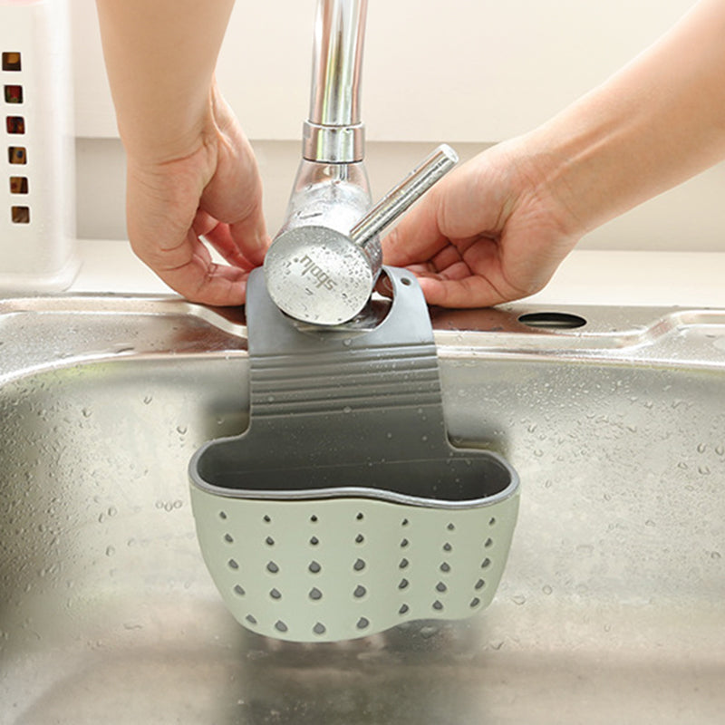 A handy kitchen accessory as sink drainer, multi - functional organizer for countertop dishes, sponges.