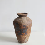 Rustic handmade ceramic vase by Cavira featuring mottled glaze, ideal for floral arrangements in Zen, Japandi, or Chinese-inspired decor.