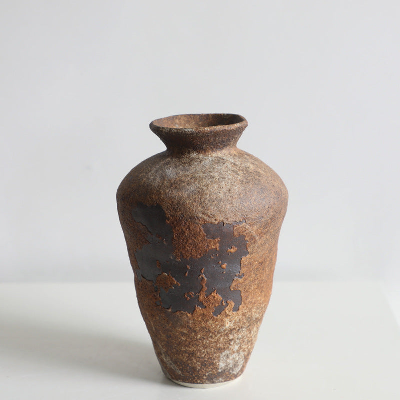 Rustic handmade ceramic vase by Cavira featuring mottled glaze, ideal for floral arrangements in Zen, Japandi, or Chinese-inspired decor.