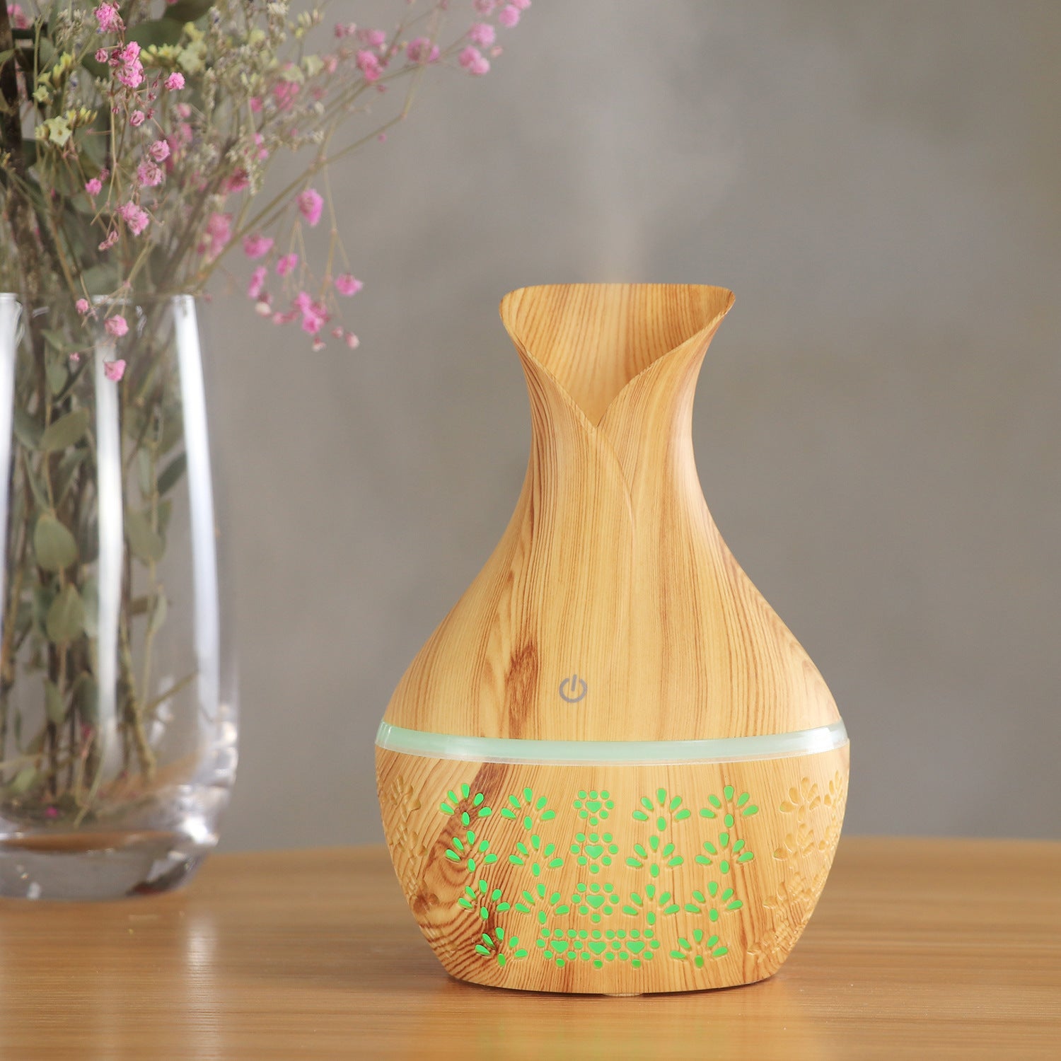 Portable Cavira USB wood grain ultrasonic humidifier with mist output, dark and light wood finishes, suitable for bedroom, study, or office