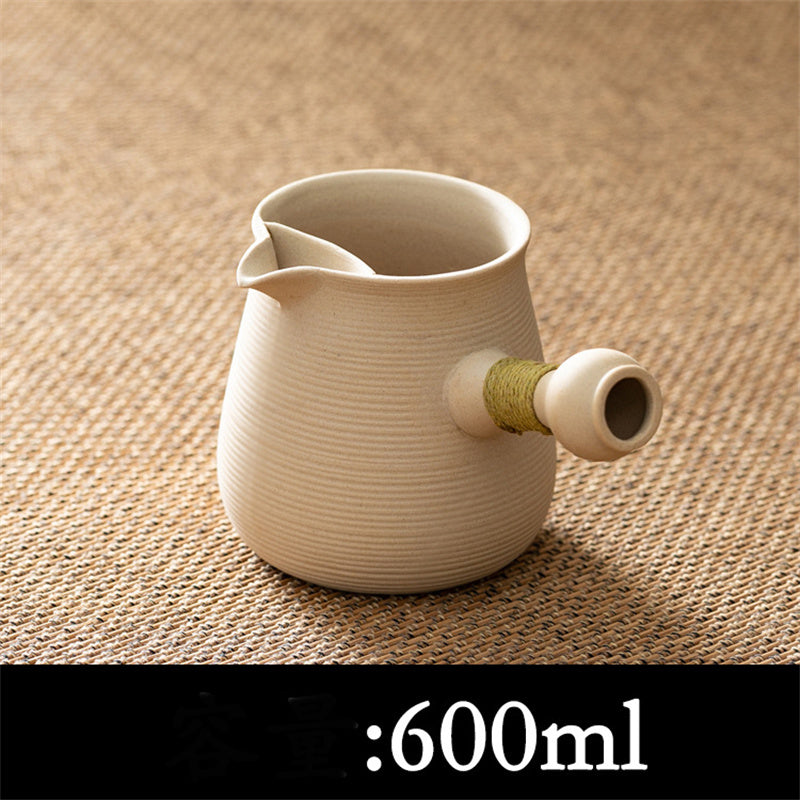 White clay boiling teapot by Cavira, 600ml traditional Bai Ni ceramic, stovetop and open flame safe for loose-leaf tea brewing.