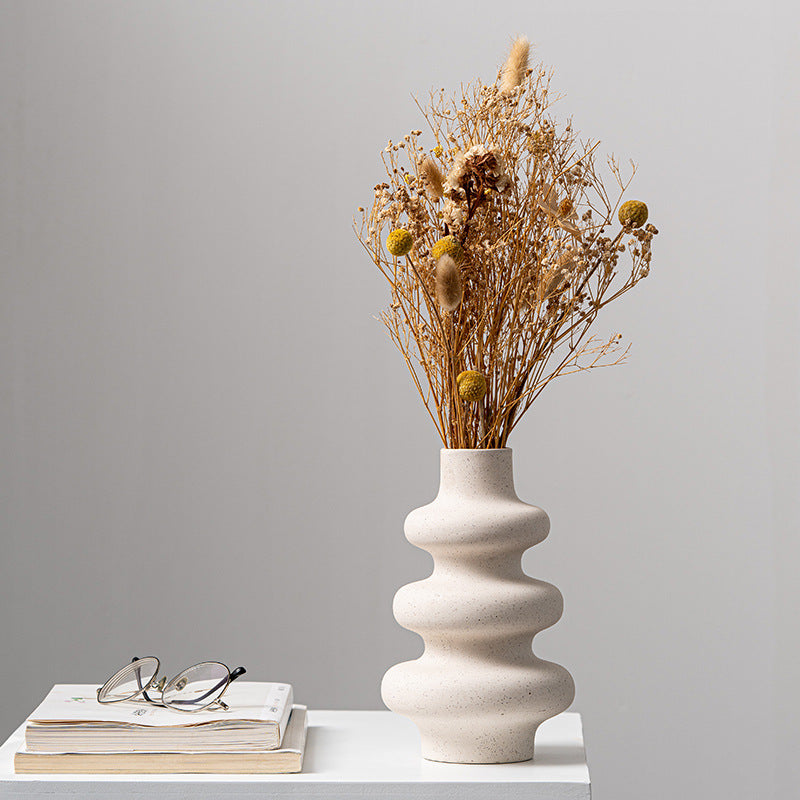 Frosted grain ceramic vase by Cavira with textured matte finish for flower arrangements, home decor, and shelf styling.