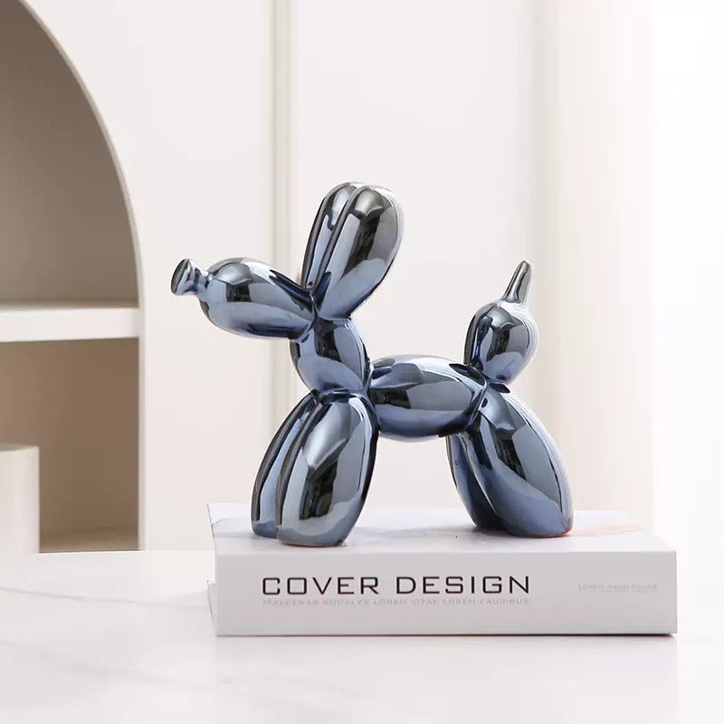 Cavira ceramic balloon dog sculpture in white, 20x18cm modern minimalist decor ornament on a shelf, available in 8 colors.