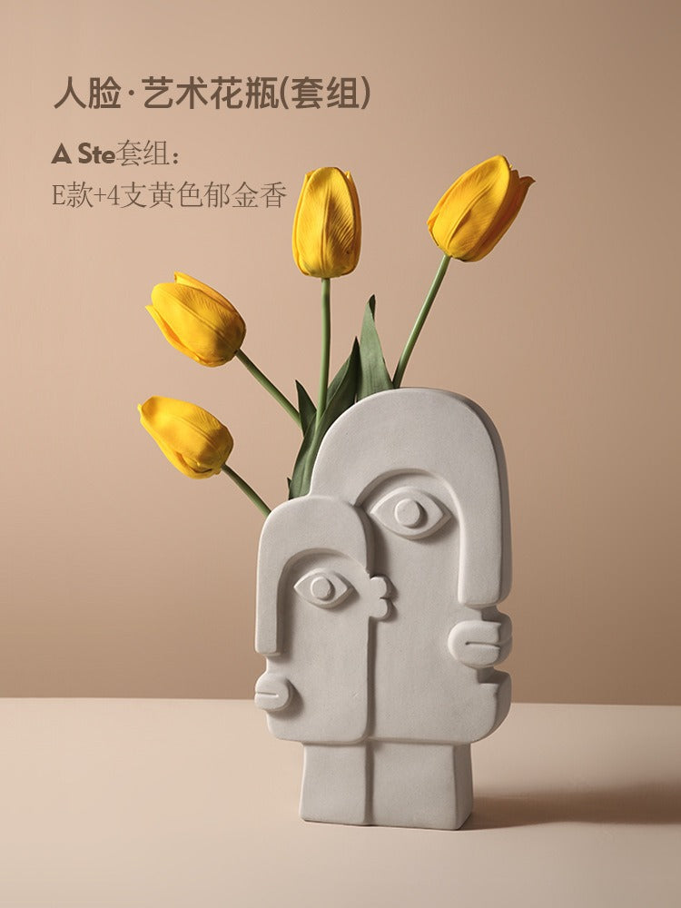Ceramic vase with geometric abstract face design by Cavira, ideal for home decor, shelf styling, or gifting purposes.