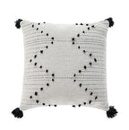 Hand embroidered bohemian throw pillow cover by Cavira with woven cotton, minimalist design for sofa, bedroom, or living room decor.