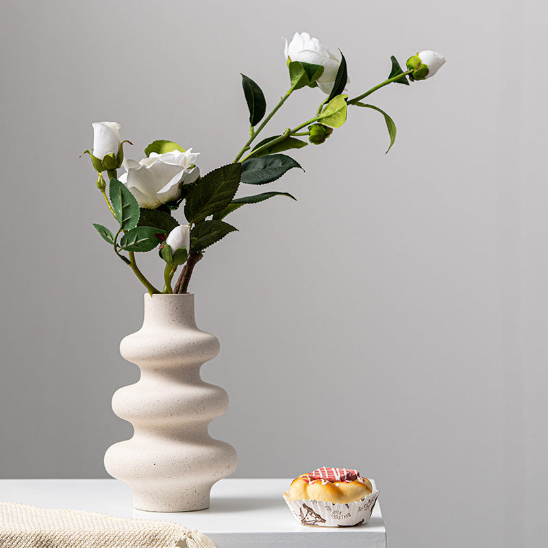 Frosted grain ceramic vase by Cavira, textured matte finish, perfect for floral arrangements, home decor, and shelf styling.