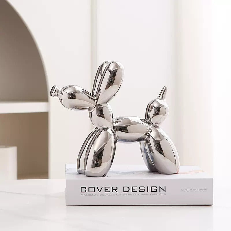 Ceramic balloon dog sculpture by Cavira, modern minimalist home décor ornament, 20x18cm, available in 8 colors for shelf or desk display.