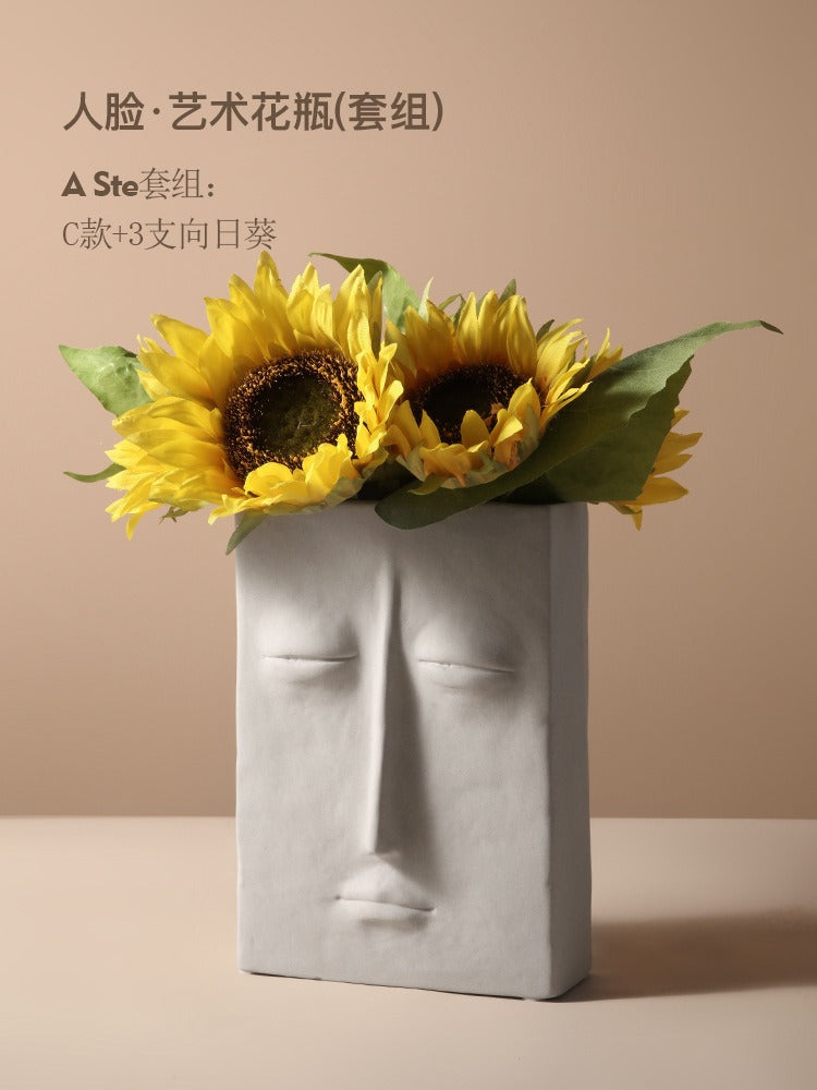 Ceramic vase with geometric abstract face design by Cavira, ideal for home decor, shelf styling, or gifting.