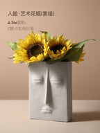 Ceramic vase with geometric abstract face design by Cavira, ideal for home decor, shelf styling, or gifting.