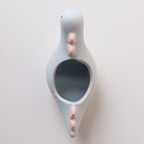 Ceramic succulent pot with elephant, dinosaur, and flower designs by Cavira, perfect for small plants on desk or shelf.