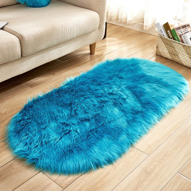 Oval acrylic plush rug by Cavira with soft imitation wool pile in 14 colors, available in multiple sizes for bedroom or living room.