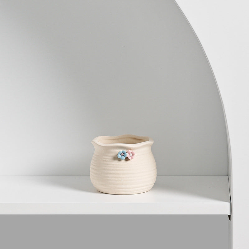 Small ceramic succulent pot by Cavira, decorative mini plant container for succulents, cacti, and air plants on desks or shelves.