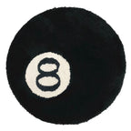 Black flocked square rug by Cavira with velvet-touch surface, available in 60, 80, and 100cm sizes for living room or bedroom.