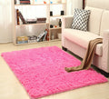 Cavira super soft shag area rug in modern silky polyester, plush floor mat suitable for living room, bedroom, or nursery.