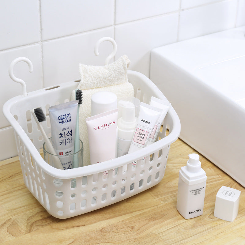 Plastic wall-mounted double hook storage basket by Cavira, ideal for organizing kitchen, bathroom, or bedroom items.