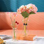 Gold and rose gold decorative glass vase by Cavira, ideal for flower arranging and home decor.