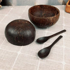 Handcrafted coconut shell bowl with wooden utensils, eco-friendly natural breakfast, smoothie, and salad bowl from eprolo.