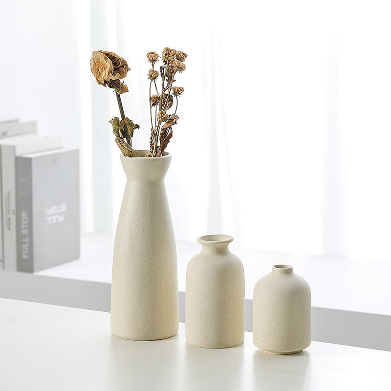 Set of three Cavira modern minimalist ceramic vases, decorative flower planters for living room, wine cabinet, and home decor.