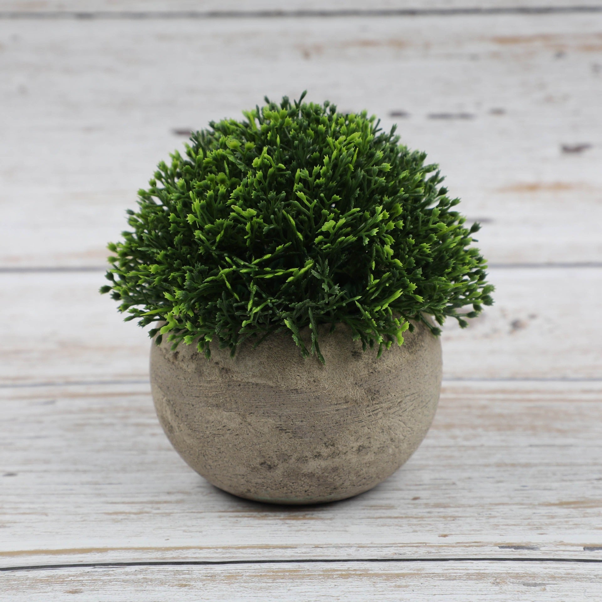 Artificial bonsai desktop plant in a semi-round pulp pot with faux grass and botanical arrangement, ideal for home or office decor.