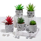 Cavira novelty hanging legs succulent pot with character face design, featuring dangling feet; cute desk or shelf décor in various styles.