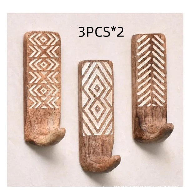 Set of 3 or 6 minimalist wood and bamboo single hooks by Cavira, suitable for bedrooms, entryways, and wardrobes, holds up to 2kg.