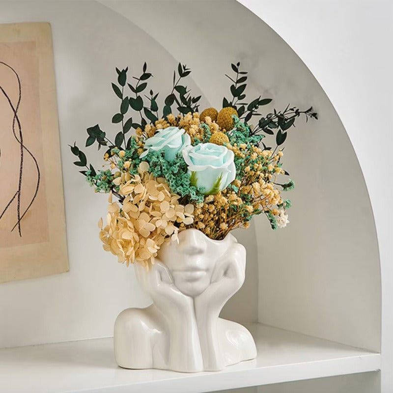 Human body ceramic art vase by Cavira featuring a Nordic sculptural figure, perfect for home decor and shelf styling.