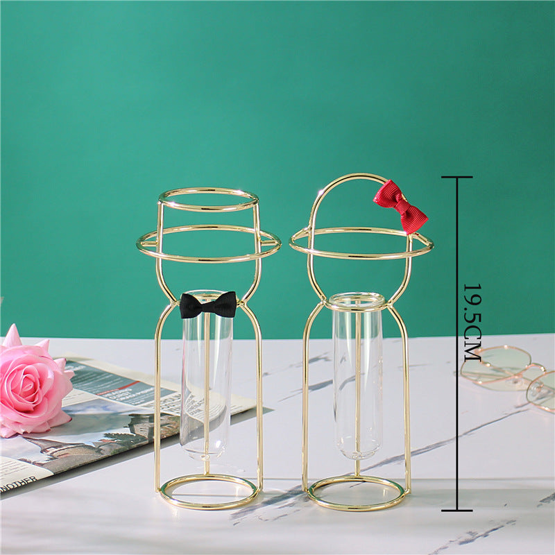 Gold and rose gold decorative glass vase by Cavira, ideal for floral arrangements and stylish home decor.