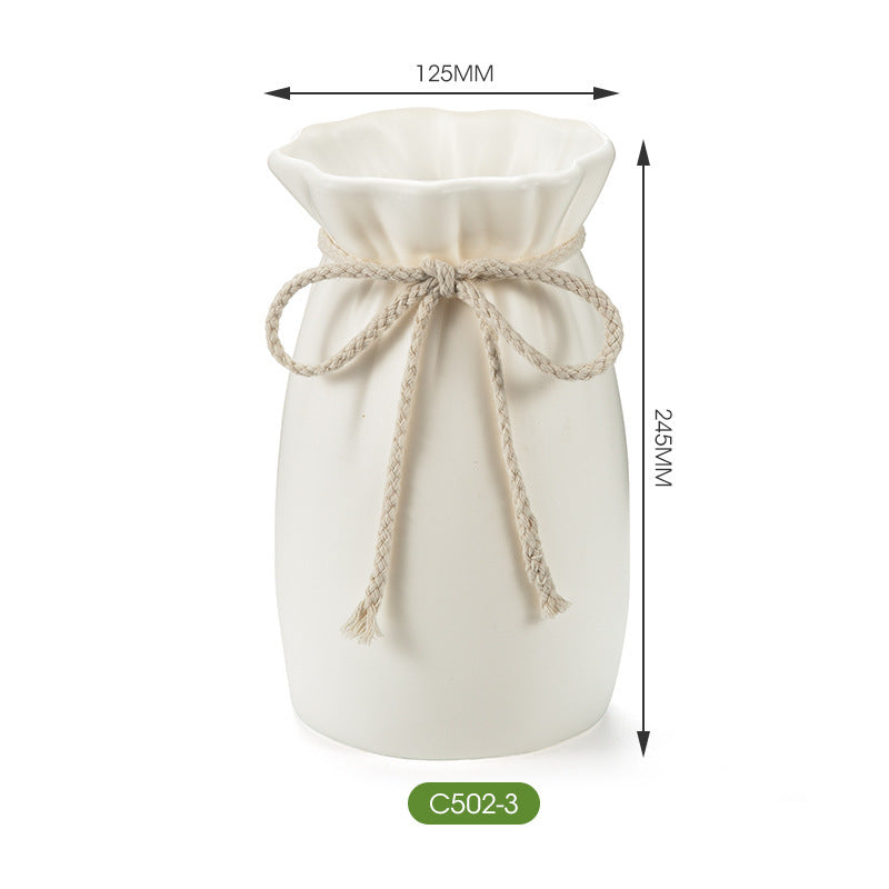 Lightweight modern plastic vase by Cavira for home decor, ideal for living rooms, bedrooms, and table styling.