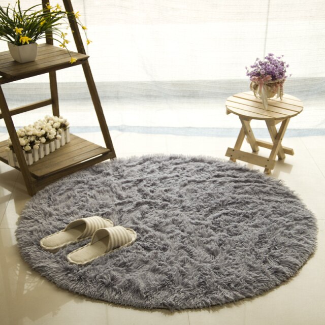 Round Cavira shaggy faux fur rug with 4.5cm pile, available in 6 sizes and 8 colors, featuring a non-slip latex base.