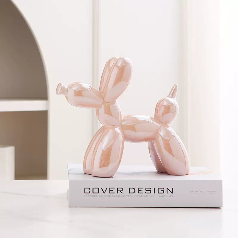 Ceramic balloon dog sculpture by Cavira, modern minimalist home décor ornament, 20x18cm in various colors, perfect for shelf or desk.