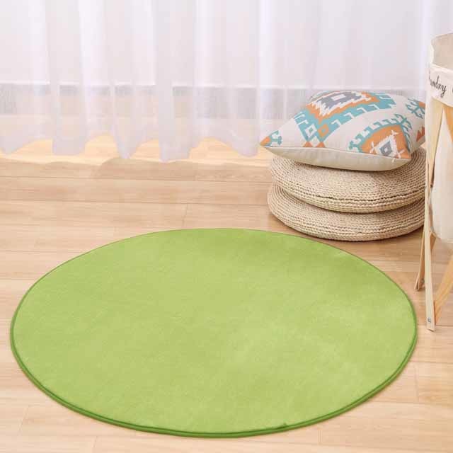 Cavira round area rug with non-slip base, soft memory foam feel, available in 8 colors and multiple sizes, suitable for various rooms.