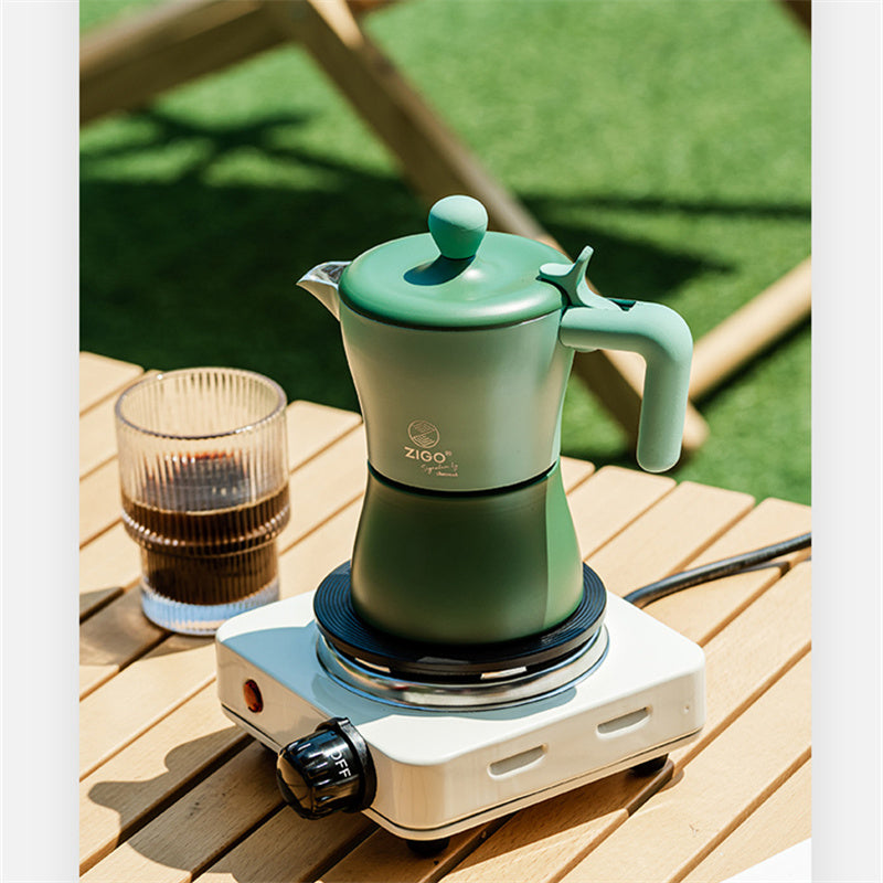 Cavira Moka Pot stovetop espresso maker in vibrant color, showcasing its compact design for rich Italian-style coffee brewing at home.
