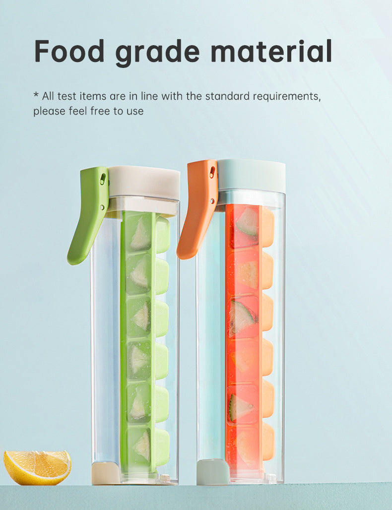 Large orange and green Cavira ice ball maker mold for whiskey, cocktails, and iced coffee, made of food-grade PP and PC.