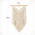 Handcrafted macramé wall hanging tapestry by Cavira, boho woven decor for bedroom, living room, or nursery.