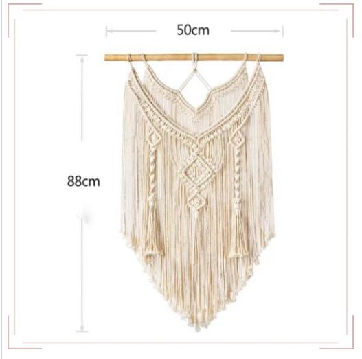Handcrafted macramé wall hanging tapestry by Cavira, boho woven decor for bedroom, living room, or nursery.