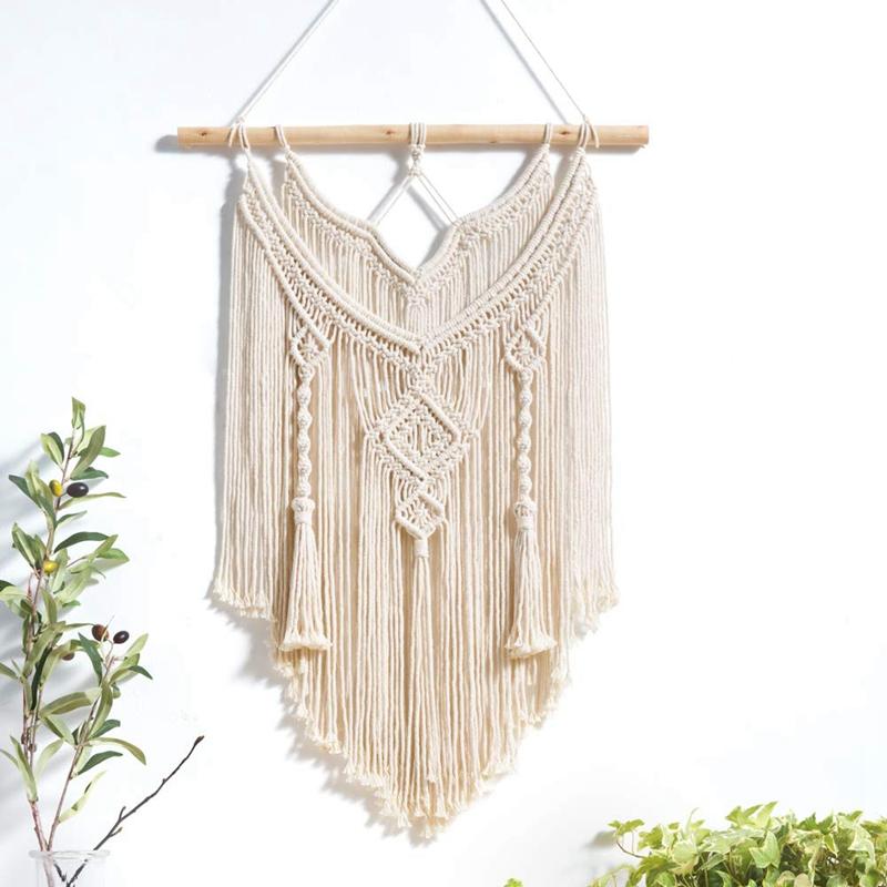 Natural macramé wall hanging tapestry by Cavira, handcrafted boho woven decor for bedroom, living room, or nursery walls.