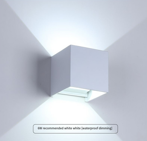 Cavira 6W LED outdoor waterproof wall lamp with adjustable angle, aluminum exterior, ideal for garden, porch, and facade lighting.