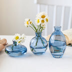 Set of three Cavira colour-dipped glass vases with light spray paint finish, ideal for home decor and floral arrangements.