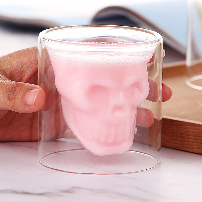 Cavira double wall skull glass made of borosilicate for whiskey, beer, and cocktails, showcasing its unique skull design and clear construction.