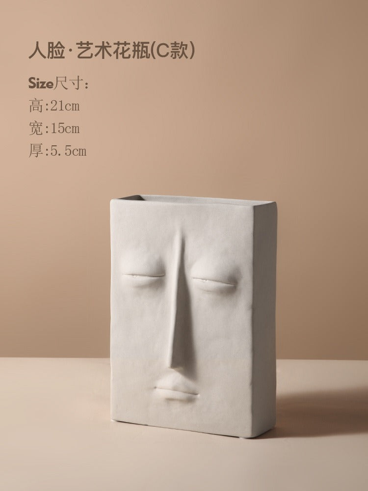 Ceramic vase with geometric abstract face design by Cavira, ideal for home decor, shelf styling, or gifting.