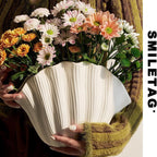 White porcelain ceramic vase by Cavira, modern minimalist design for hydroponic flower arrangements and home decor.