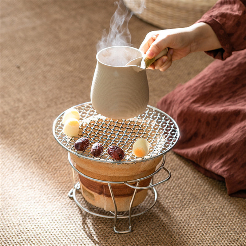 White clay boiling teapot by Cavira, 600ml traditional Bai Ni ceramic for stovetop and open flame tea brewing.