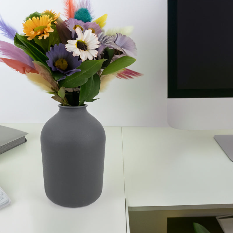 White matte metal vase with unique sculptural shape, perfect for dried flowers, pampas grass, and table décor in two sizes.